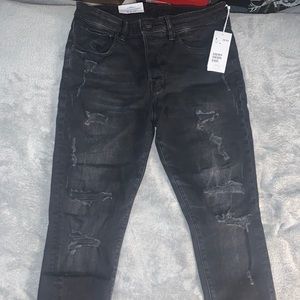 Black men’s ripped jeans